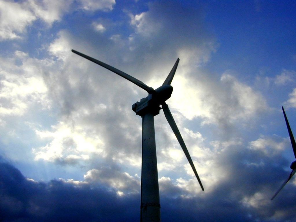 Wind-farm turbine set against the sky