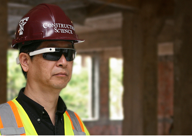 Man wearing hardhat with sunglasses and Google Glass