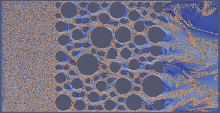 a computer simulation of sand flowing through porous rock